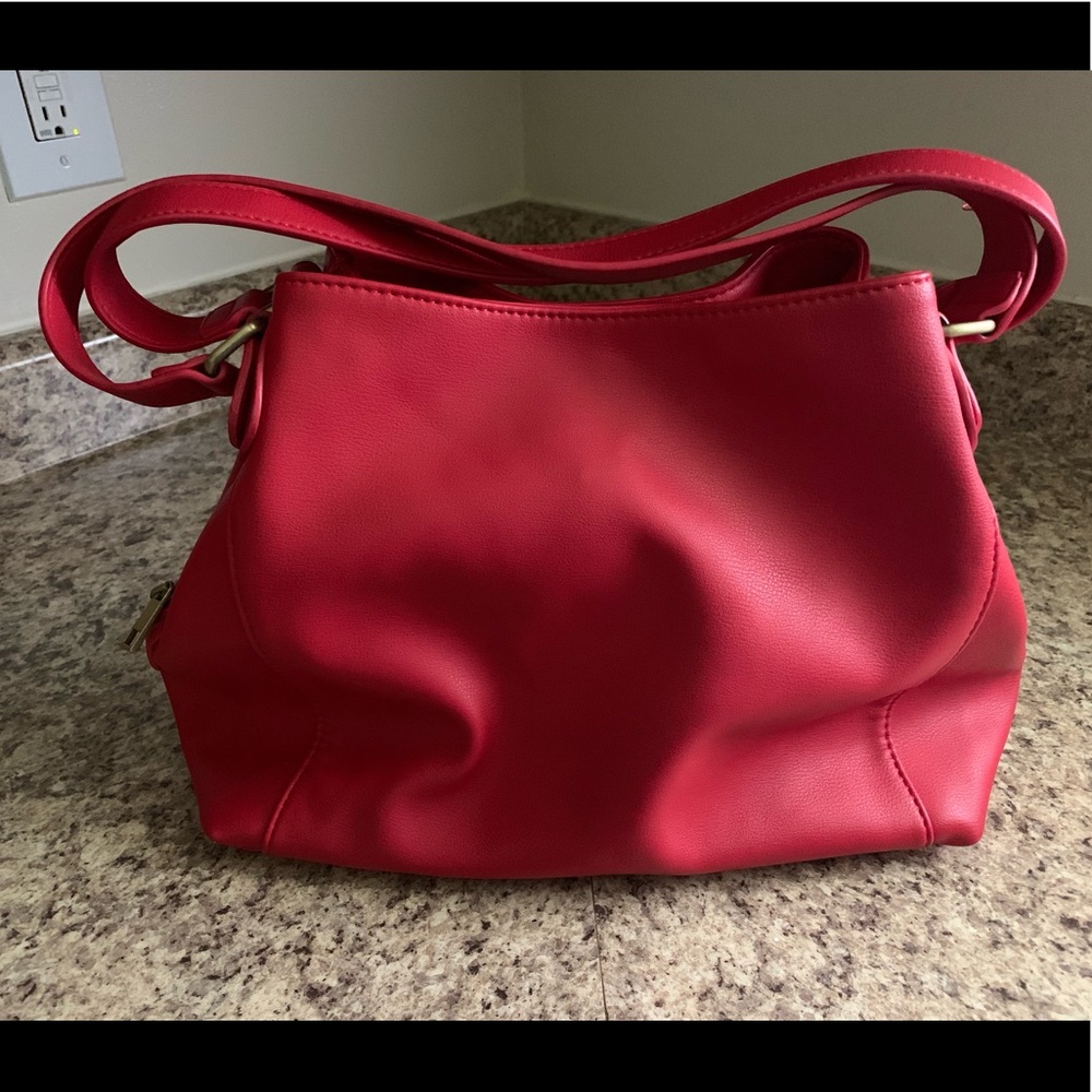 Very fashionable Street Level red handbag.